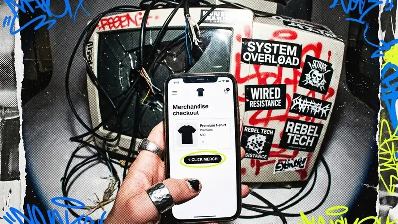 A creator holding a smartphone that shows a clean Teezzi merch checkout in front of a collage-style background.